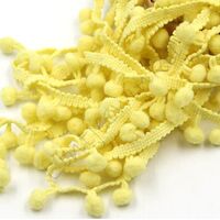 Pompom band 10mm (afmeting bolletje) - Licht Geel